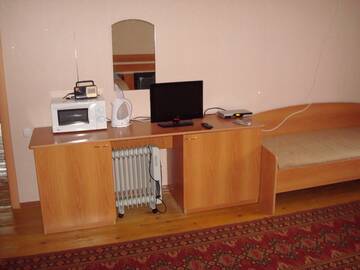 Фото номера Двухместный Стандарт (2 односпальные кровати) Гостиница Отель Петровский г. Брянск 4